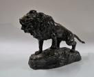 CARTIER Thomas François, Lion rugissant sur un rocher, bronze, 37x55cm,XIXe