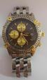 Breitling. Chronographe acier. Vers 1995 - Boîtier rond. Cadran marron