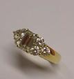 Bague en or jaune 18K (750°/00) sertie de diamants taillés en émeraude
