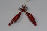 Paire de pendants d'oreilles en or gris sertis de corail traités